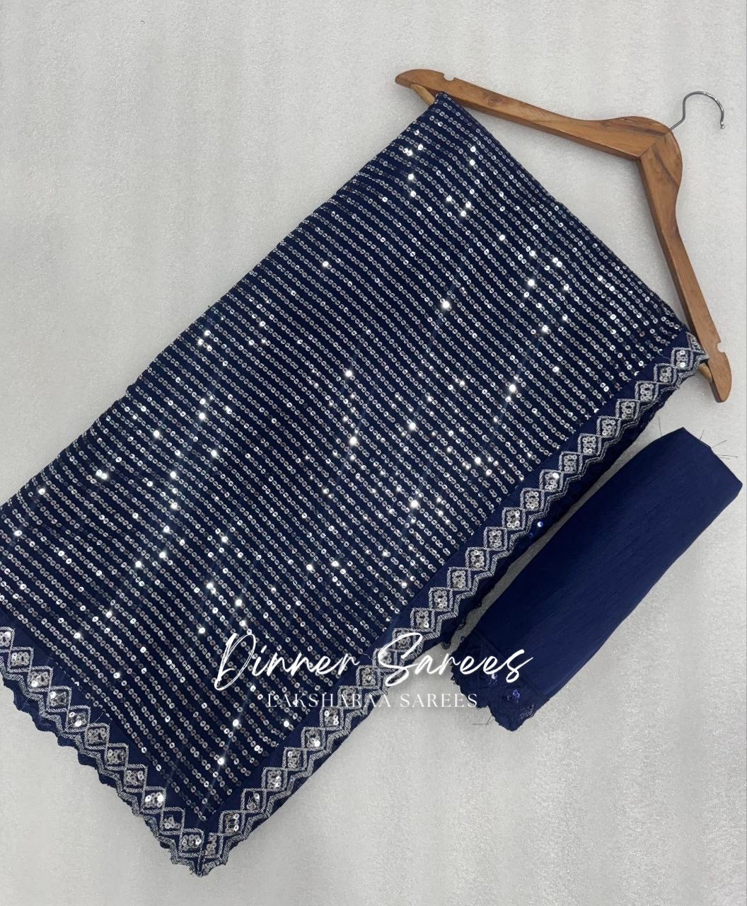 Dark blue partywear saree from Laksharaa Sarees inspired by Trisha, featuring elegant draping and intricate embroidery.