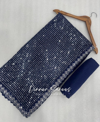Dark blue partywear saree from Laksharaa Sarees inspired by Trisha, featuring elegant draping and intricate embroidery.