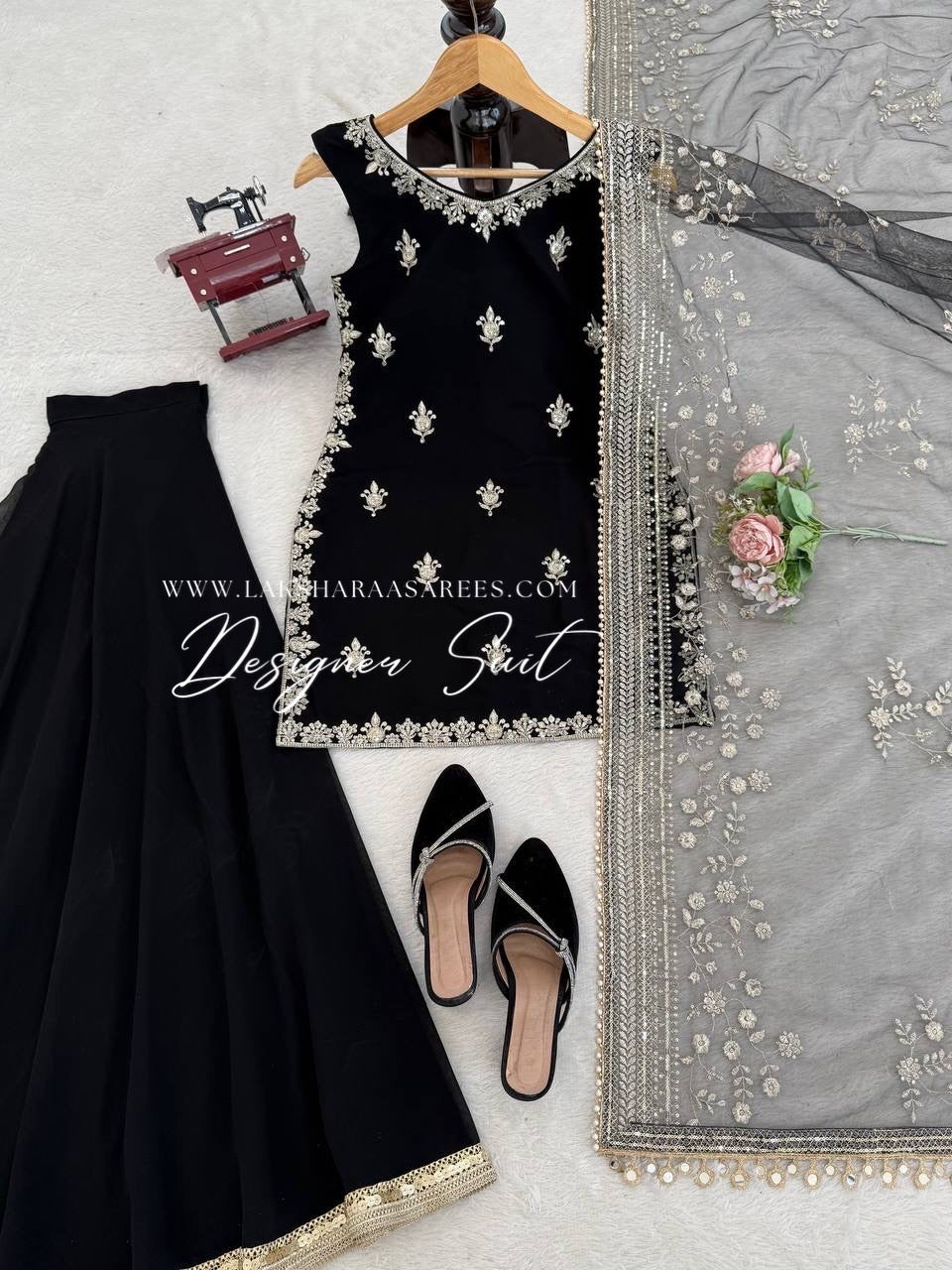 Black georgette palazzo suit from Laksharaa Sarees featuring traditional design and elegant fabric for stylish ethnic wear.