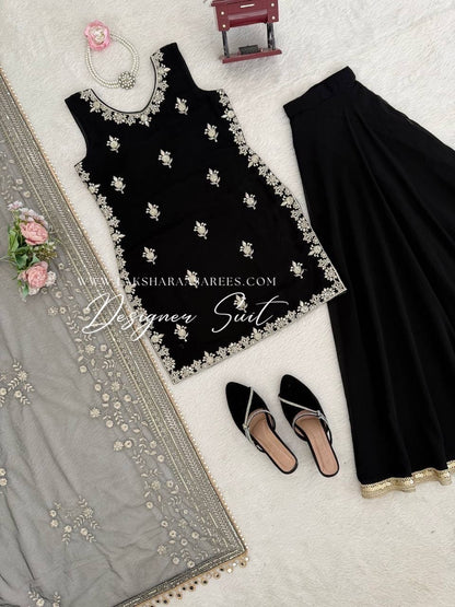 Black Georgette Pallazo Suit from Laksharaa Sarees featuring a flowing silhouette and intricate detailing.