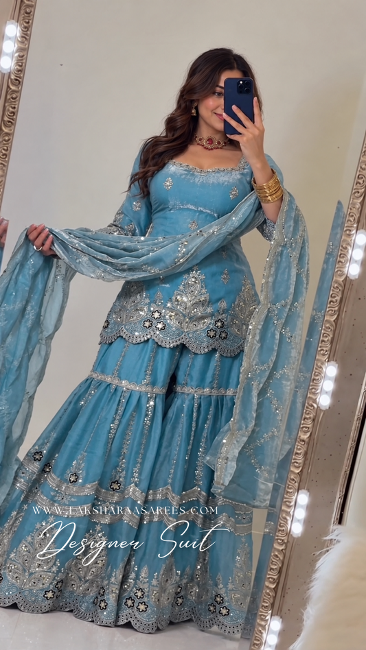 Laksharaa Sarees Veronica shimmer sharara suit with intricate embroidery and flowing fabric, traditional Indian attire for special occasions.