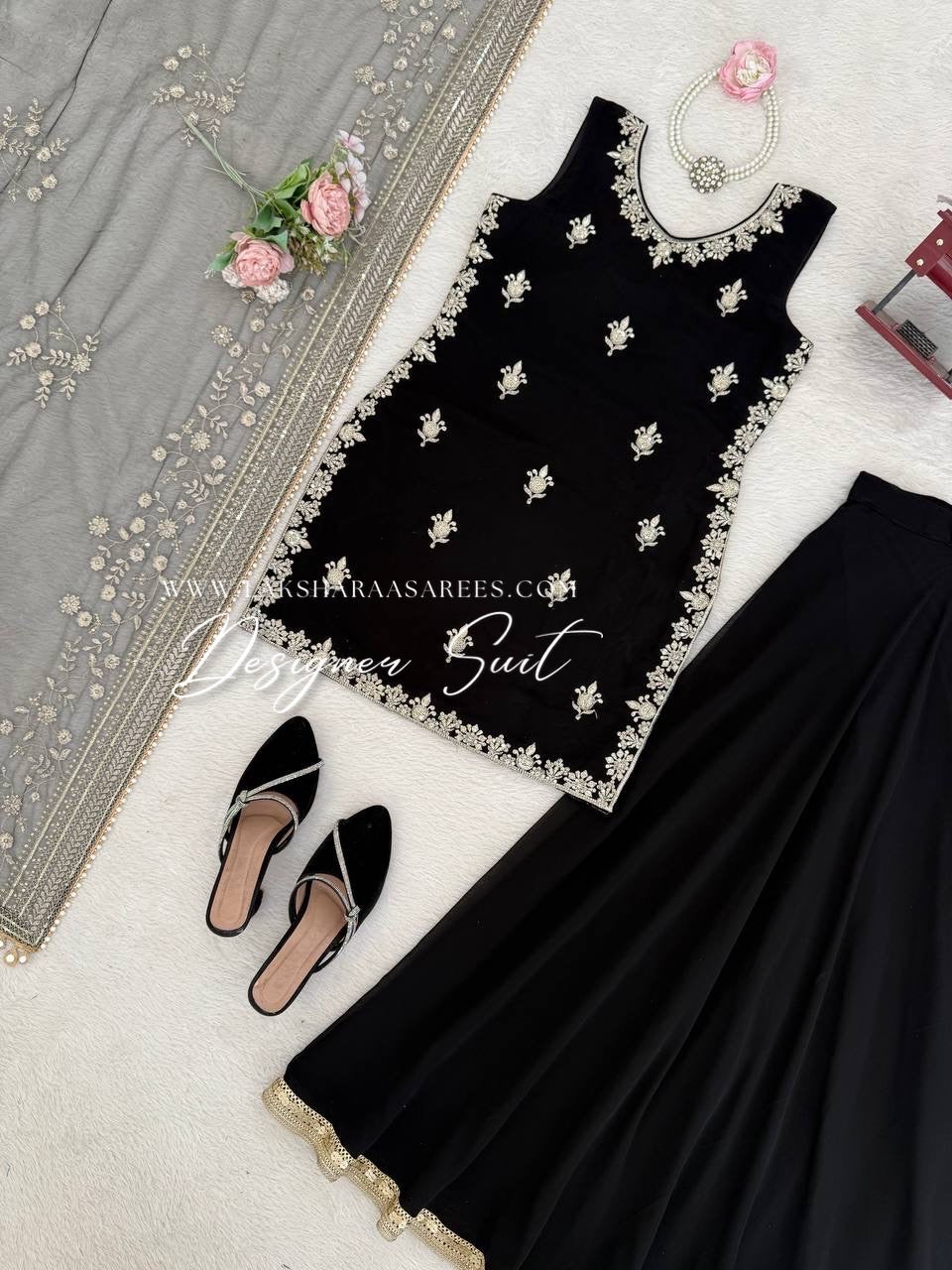 Black georgette palazzo suit from Laksharaa Sarees featuring a traditional design and elegant fit.