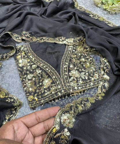 VARNA —  Black Designer Rangoli Georgette Saree