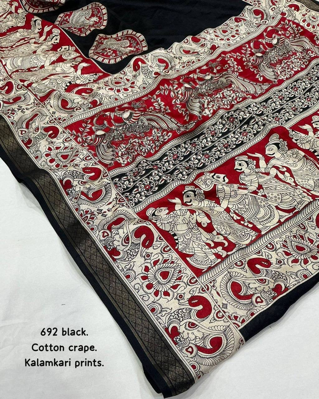 Black and red soft cotton crepe Kalamkari saree with intricate hand-painted patterns by Laksharaa Sarees.