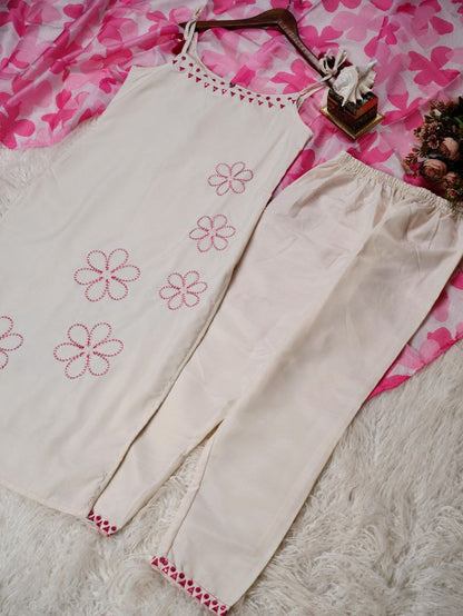 Cute floral sleeveless kurti set by Laksharaa Sarees featuring vibrant patterns and comfortable fit, perfect for casual wear.