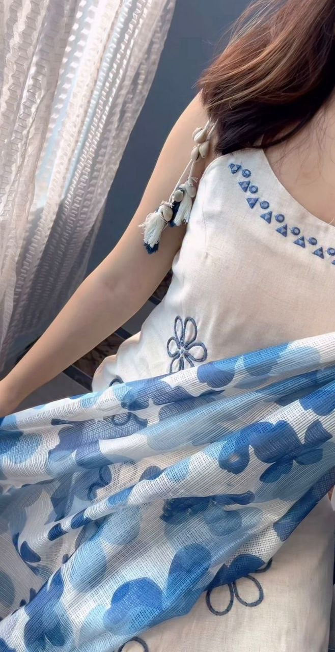Floral sleeveless kurti set by Laksharaa Sarees featuring vibrant flower patterns and traditional Indian design.