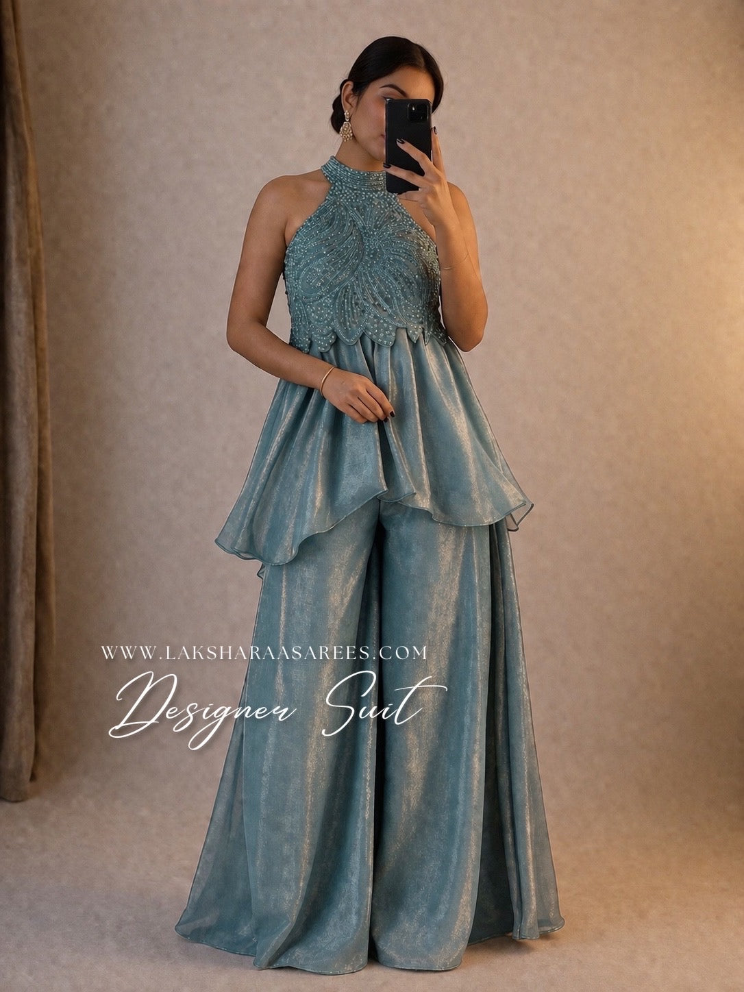 Shimmer silk halter top designer suit with matching palazzo pants by Laksharaa Sarees, featuring elegant fabric and intricate detailing.