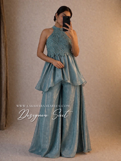 Shimmer silk halter top designer suit with matching palazzo pants by Laksharaa Sarees, featuring elegant fabric and intricate detailing.
