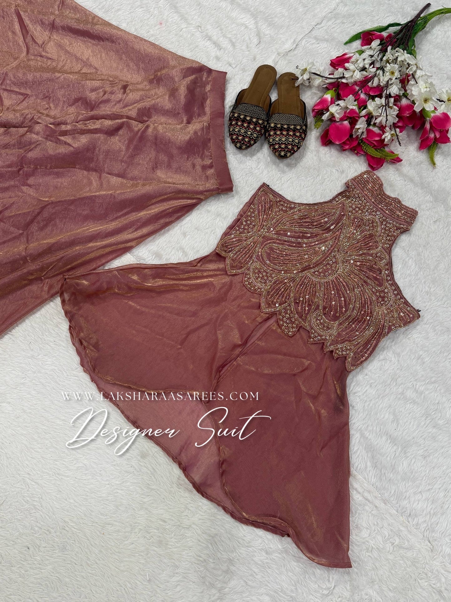 Shimmer silk halter top designer suit with matching palazzo pants in vibrant colors, featuring intricate embroidery and elegant design.