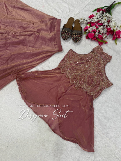 Shimmer silk halter top designer suit with matching palazzo pants in vibrant colors, featuring intricate embroidery and elegant design.