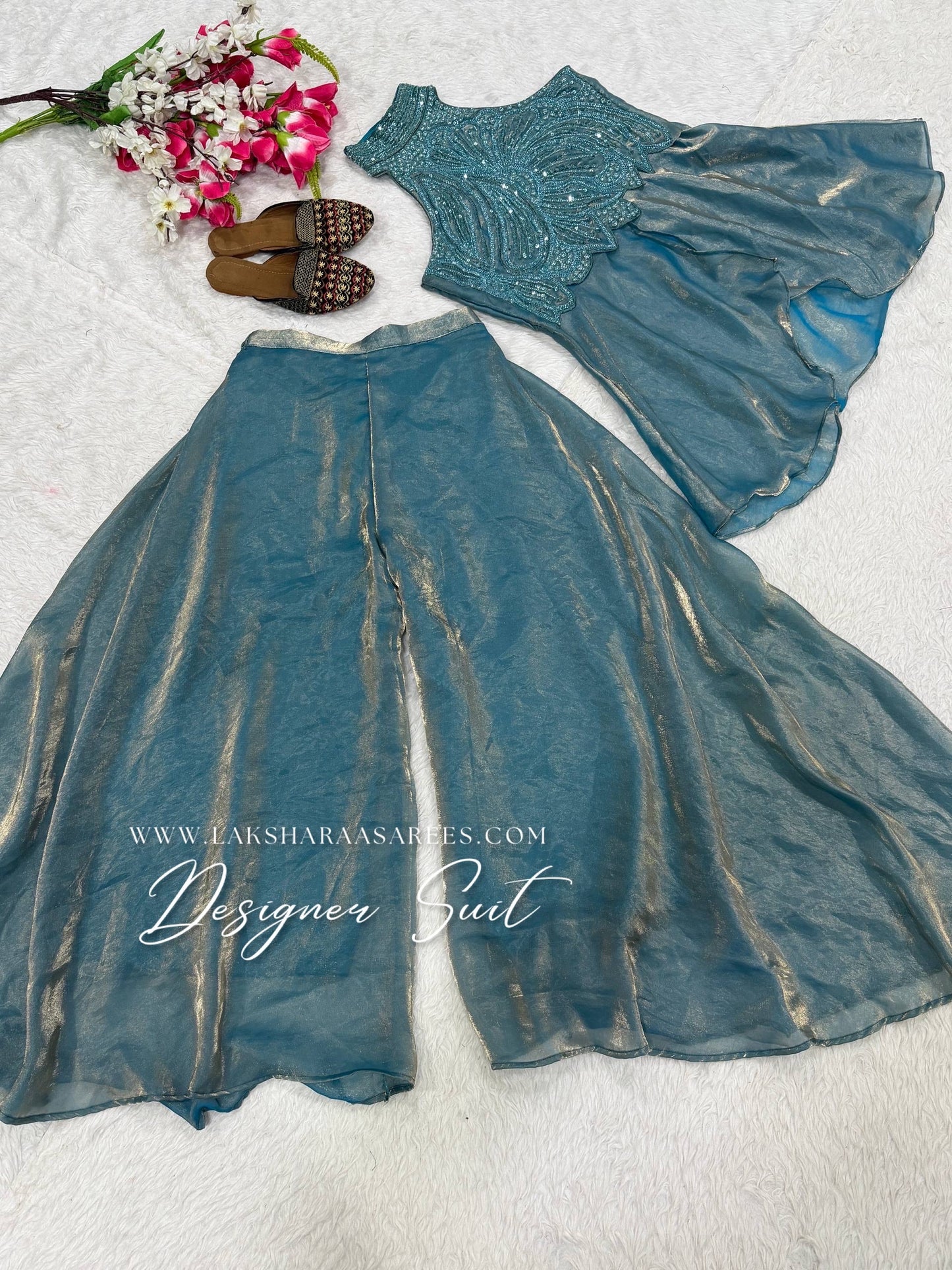 Shimmer silk halter top designer suit with matching palazzo pants in vibrant colors, crafted by Laksharaa Sarees.