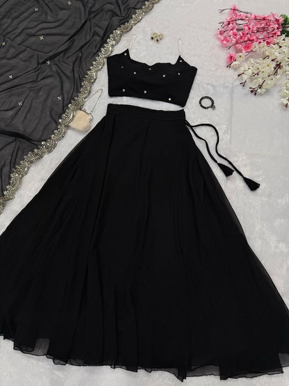 Beaded strap blouse with intricate detailing paired with a vibrant readymade lehenga from Laksharaa Sarees.