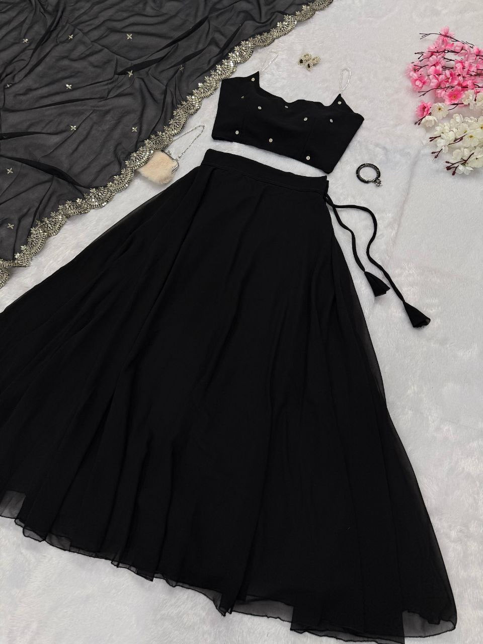 Beaded strap blouse paired with Amy readymade lehenga in vibrant fabric, detailed embroidery and intricate beadwork.