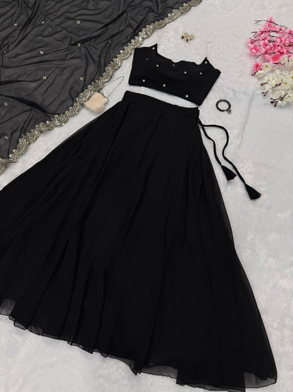 Beaded strap blouse paired with Amy readymade lehenga in vibrant fabric, detailed embroidery and intricate beadwork.