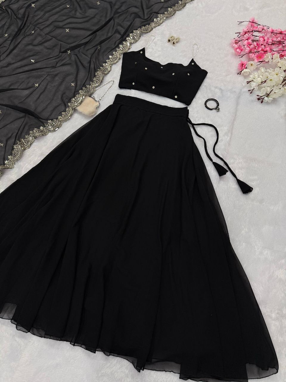 Beaded strap blouse paired with a ready-made lehenga from Laksharaa Sarees, featuring intricate beadwork and vibrant embroidery.