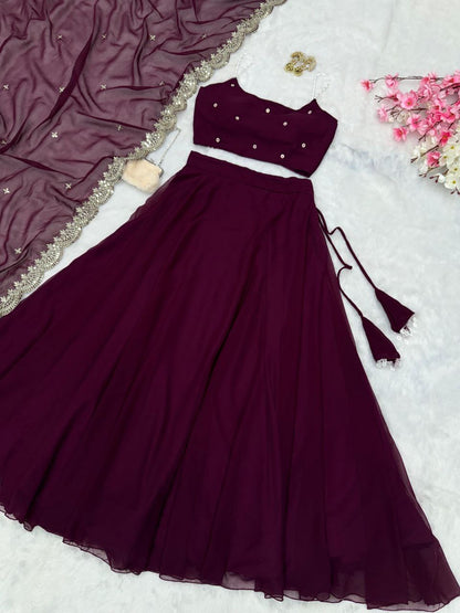 Beaded strap blouse with intricate embroidery paired with a vibrant readymade lehenga from Laksharaa Sarees.