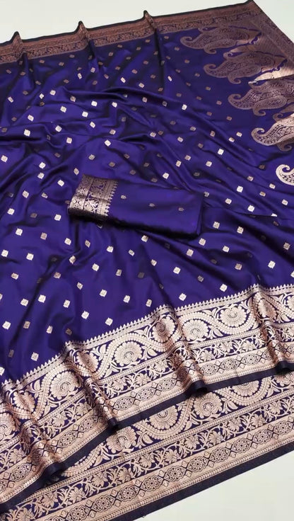 NILAA dual toned Banarasi soft silk saree with intricate gold zari work, draped on a mannequin showcasing vibrant colors and traditional design.