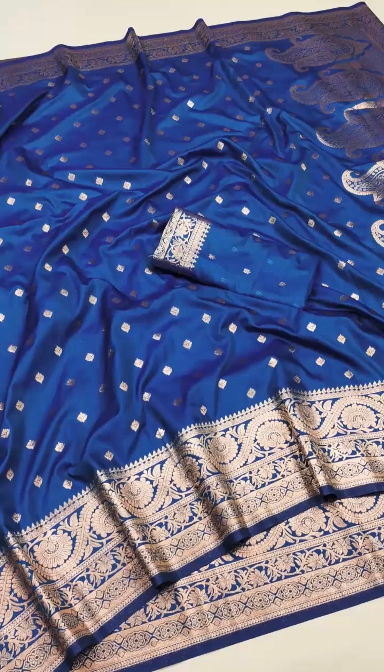 Elegant NILAA dual-toned Banarasi soft silk saree with intricate gold zari work, showcasing vibrant colors and luxurious texture.