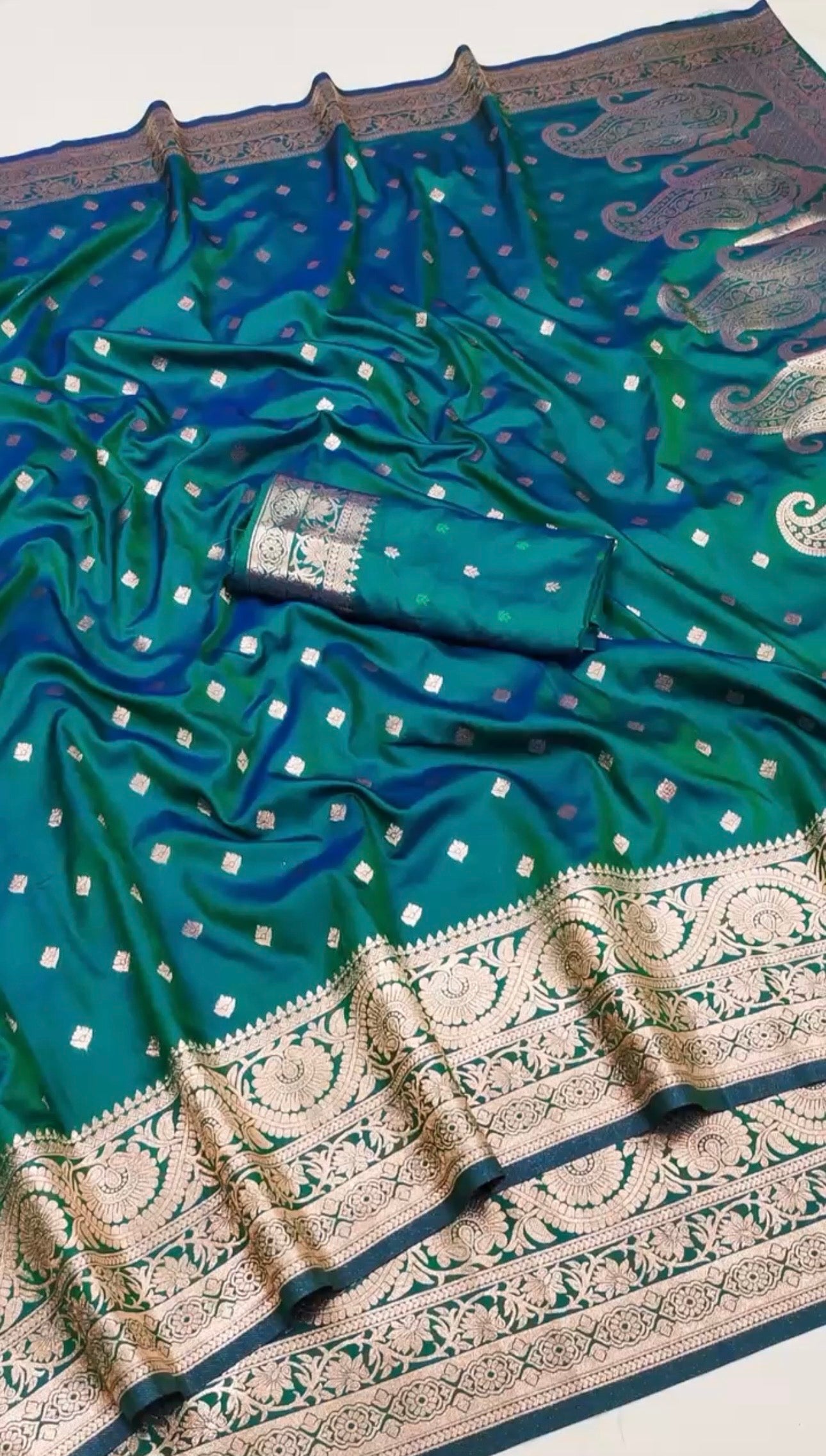 Elegant NILAA dual-toned Banarasi soft silk saree with intricate gold zari work, showcasing rich traditional craftsmanship.