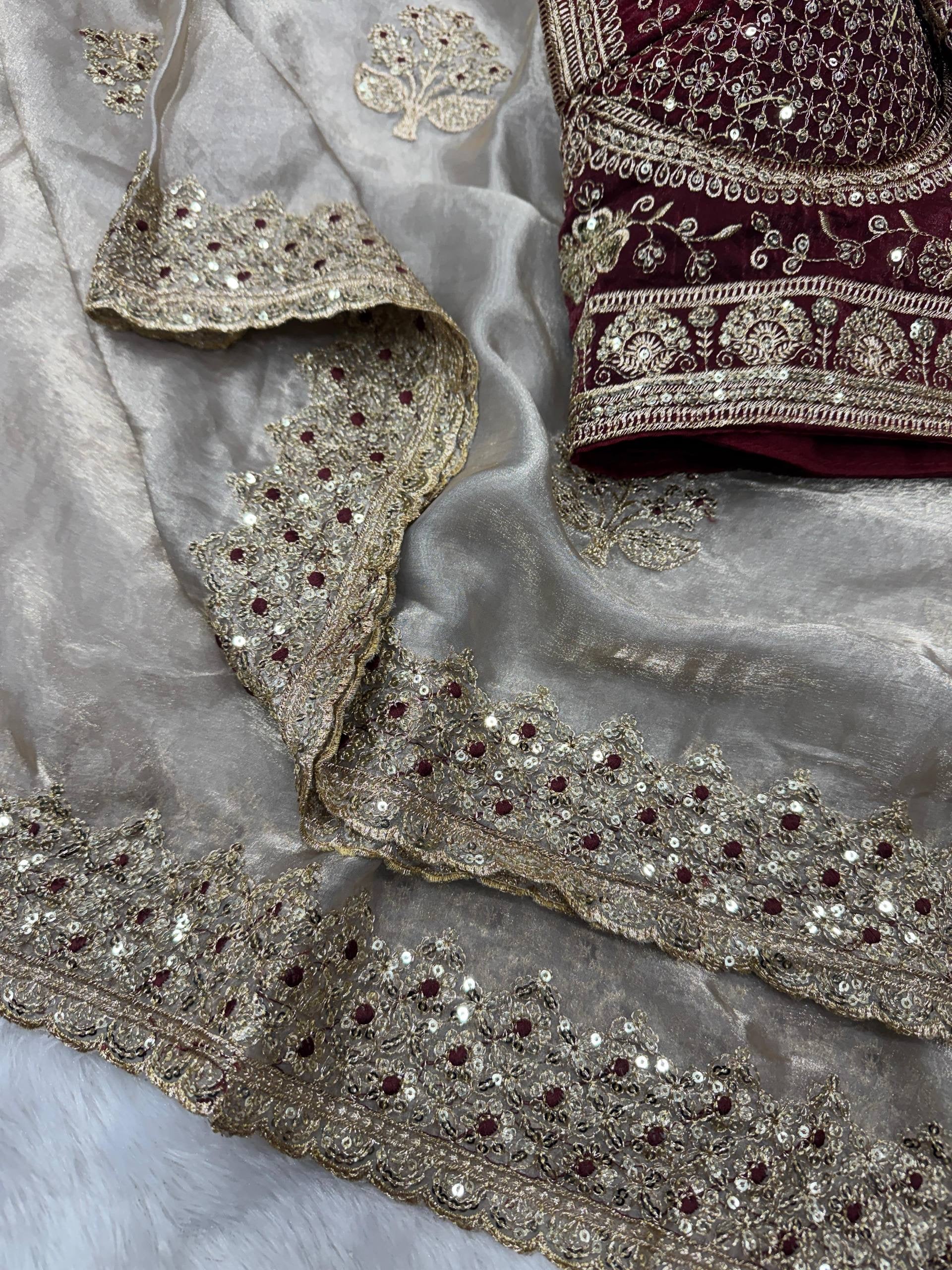 Laksharaa Sarees JESSIA premium shimmer saree with matching readymade blouse, featuring elegant drape and intricate detailing.