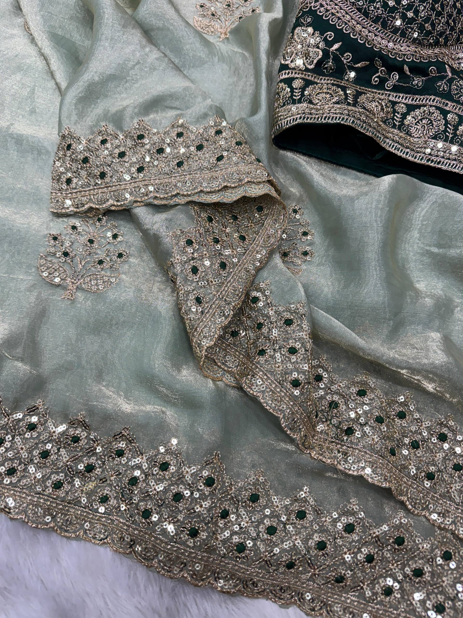 Luxurious shimmer saree with matching readymade blouse by Laksharaa Sarees, featuring intricate details and elegant drape.
