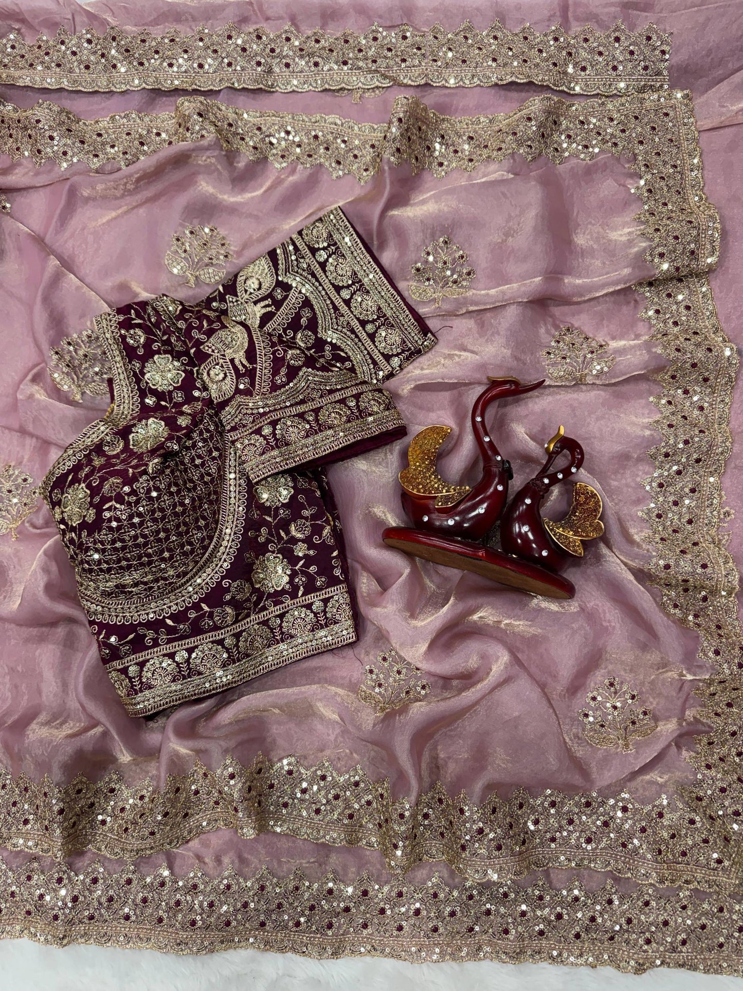 Elegant shimmer saree with readymade blouse from Laksharaa Sarees, showcasing intricate detailing and luxurious fabric.