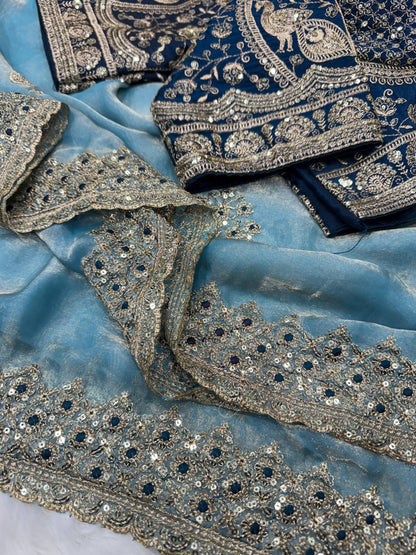 Laksharaa Sarees JESSIA premium shimmer saree with matching readymade blouse, featuring elegant fabric and intricate design details.