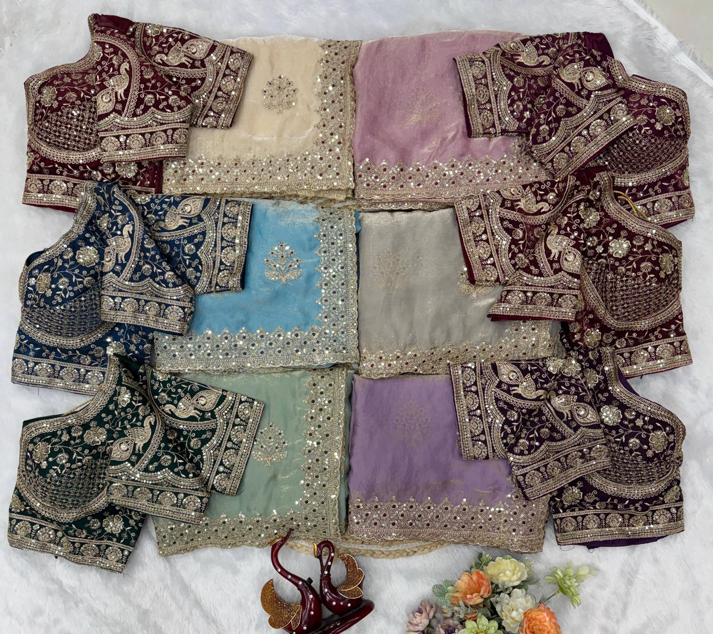 Laksharaa Sarees Jessia premium shimmer saree with intricate embroidery and matching readymade blouse, draped elegantly.