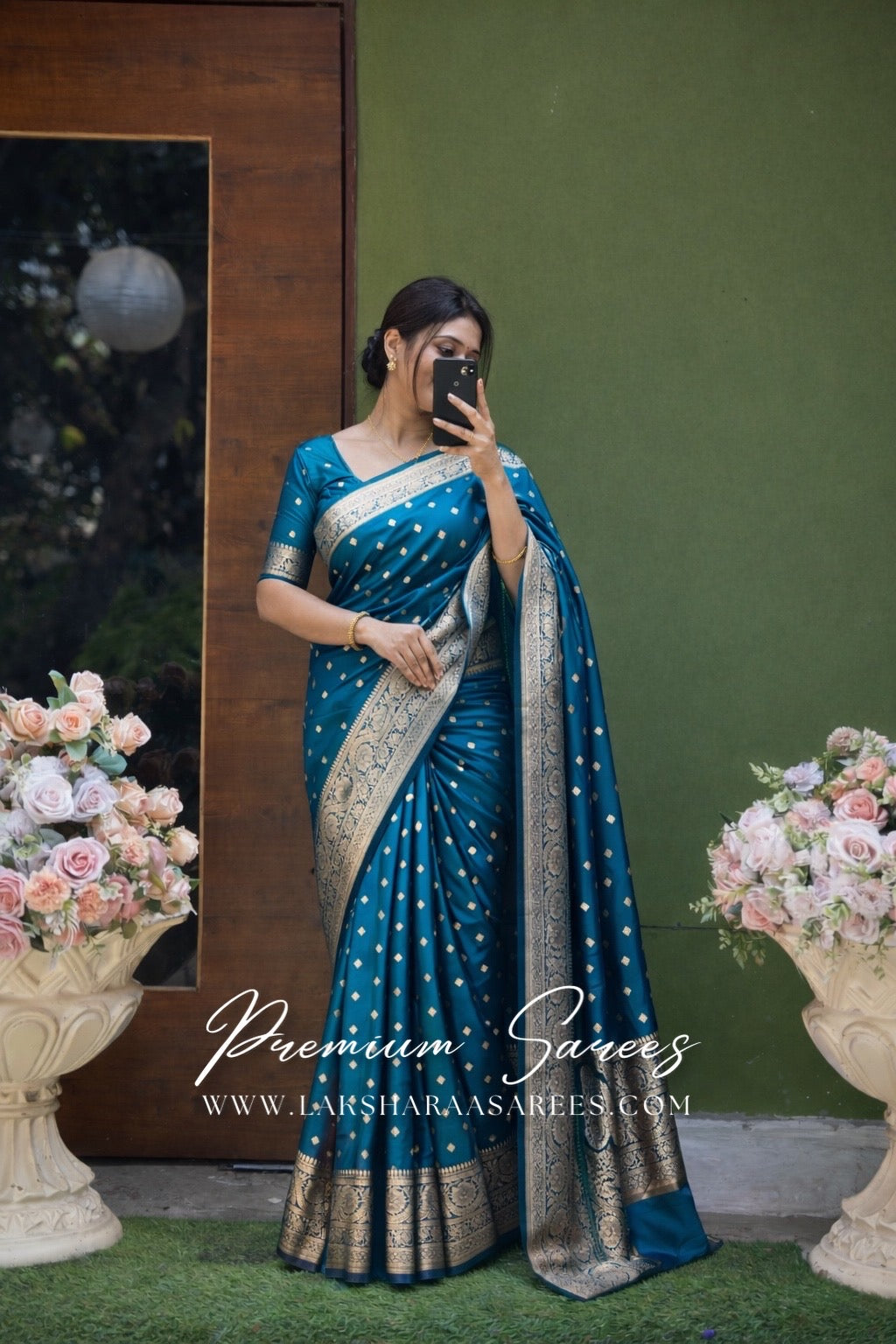 Dual toned Laksharaa Sarees Banarasi soft silk saree with intricate gold zari work and traditional design, displayed on a hanger.