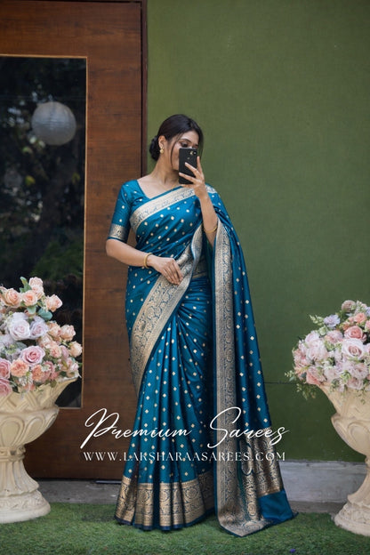 Dual toned Laksharaa Sarees Banarasi soft silk saree with intricate gold zari work and traditional design, displayed on a hanger.