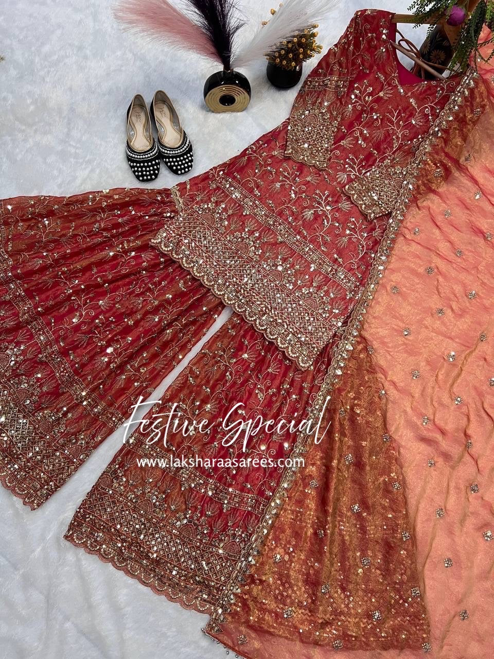 Elegant MITALI Grand Premium Shararas by Laksharaa Sarees featuring intricate embroidery and vibrant traditional design.