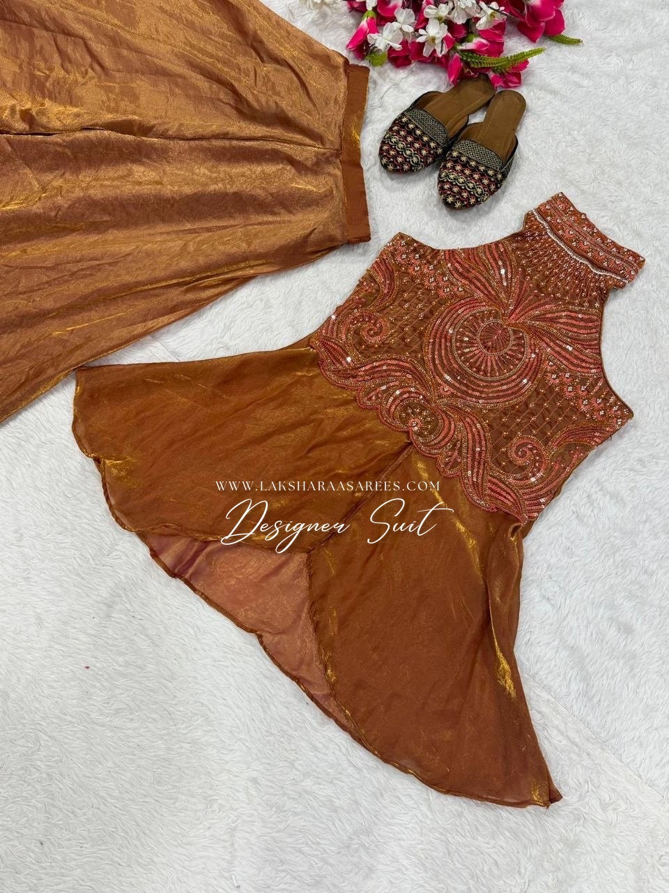Shimmer silk halter top designer suit with matching palazzo pants by Laksharaa Sarees, featuring elegant embroidery and vibrant fabric.