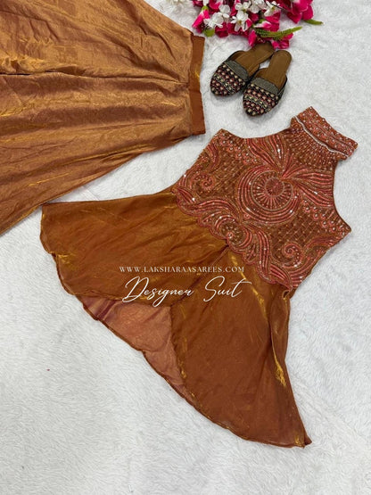 Shimmer silk halter top designer suit with matching palazzo pants by Laksharaa Sarees, featuring elegant embroidery and vibrant fabric.