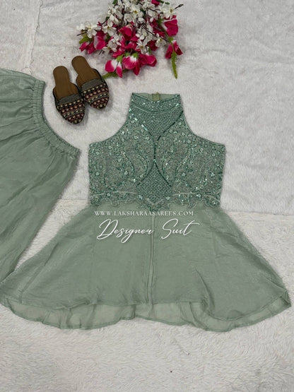 Shimmer silk halter top designer suit with matching palazzo pants by Laksharaa Sarees, featuring elegant, intricate embroidery.