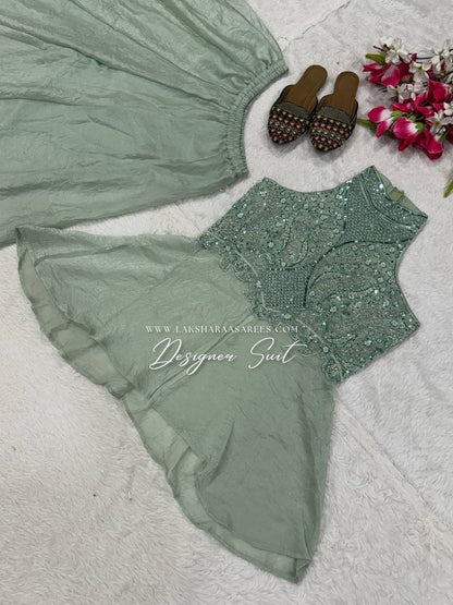 Shimmer silk halter top designer suit with matching palazzo pants by Laksharaa Sarees, featuring intricate embroidery and elegant design