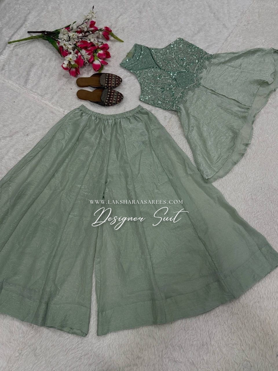 Shimmer silk halter top designer suit with matching palazzo pants by Laksharaa Sarees, featuring elegant embroidery and stylish design.