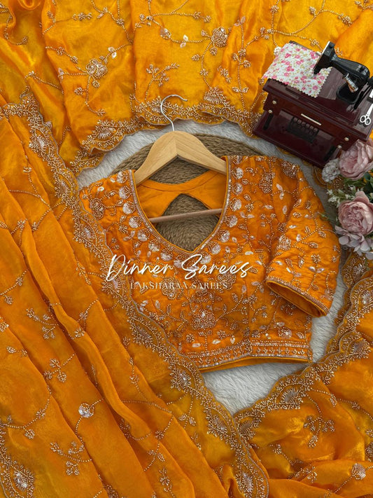 Laksharaa Sarees MEENA Designer Saree Mustard Yellow laid out with embroidered blouse and border