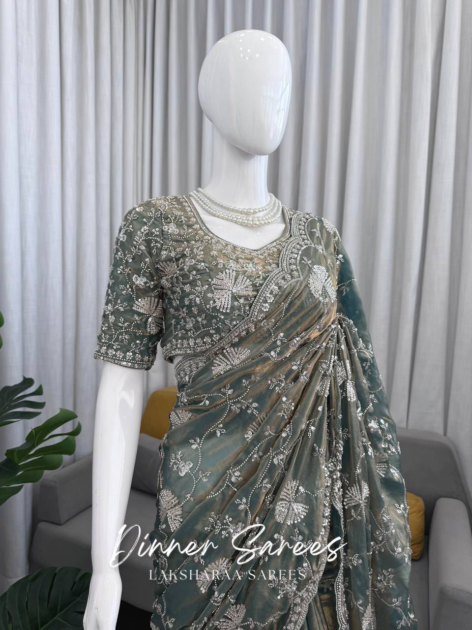 Laksharaa Sarees MERLIN Grey Shimmer Partywear Saree with sequin work on mannequin, upper body close-up
