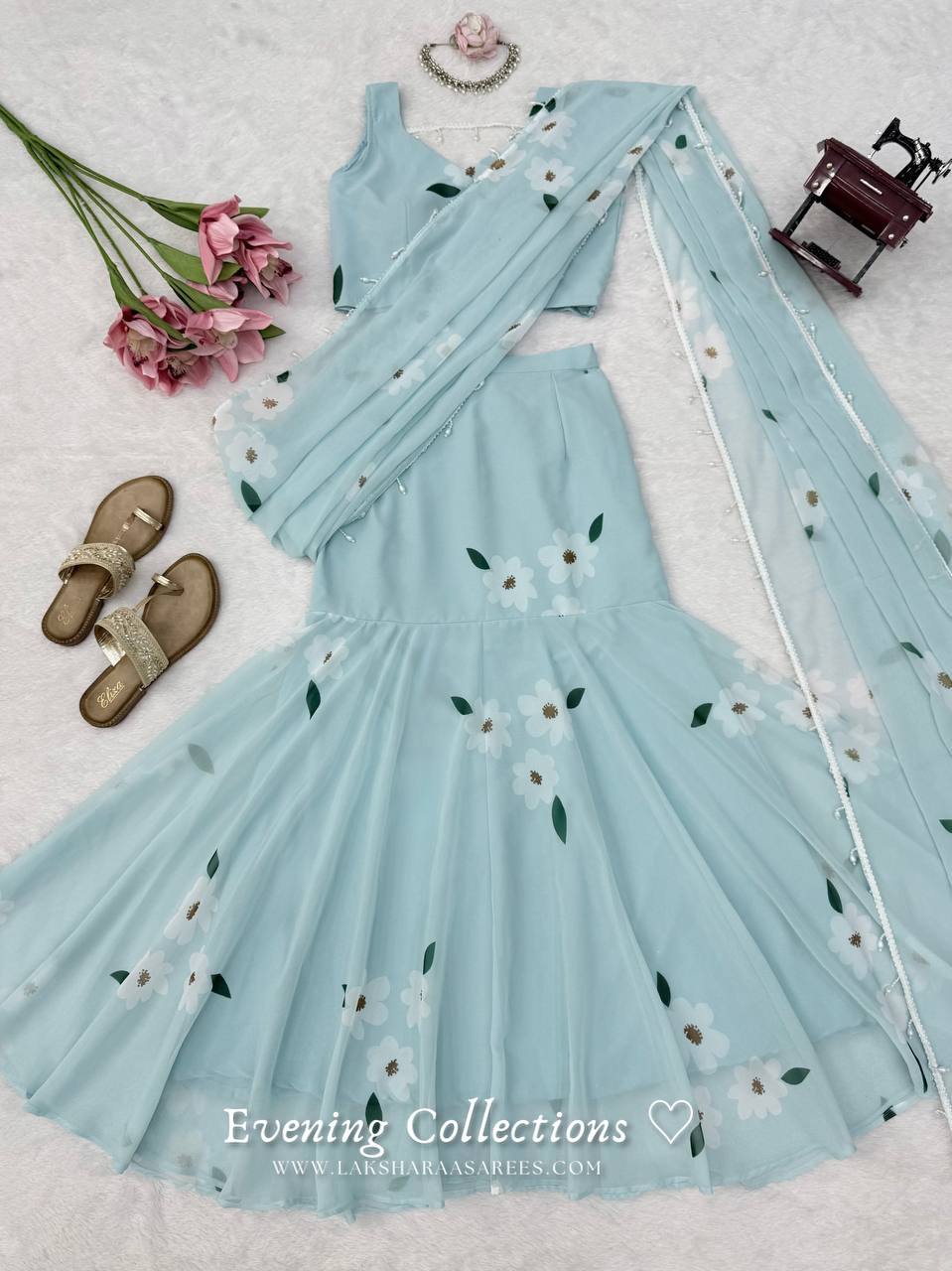 Laksharaa Sarees MAISY Aqua Lehenga Saree Set Flat Lay with Decorative Items