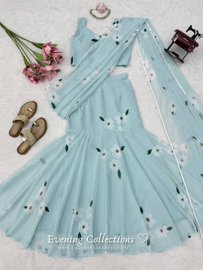 Laksharaa Sarees MAISY Aqua Lehenga Saree Set Flat Lay with Decorative Items