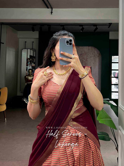 Laksharaa Sarees VENBA Kanchi Cotton Chex Half Saree Lehenga Red and Orange Checks with Burgundy Front View with Phone