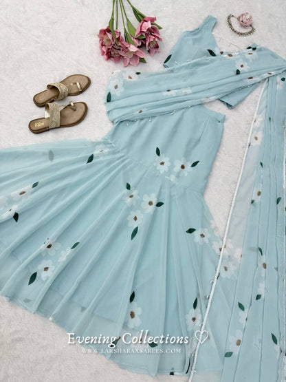 Laksharaa Sarees MAISY Aqua Lehenga Saree Set Flat Lay with Flowers and Sandals