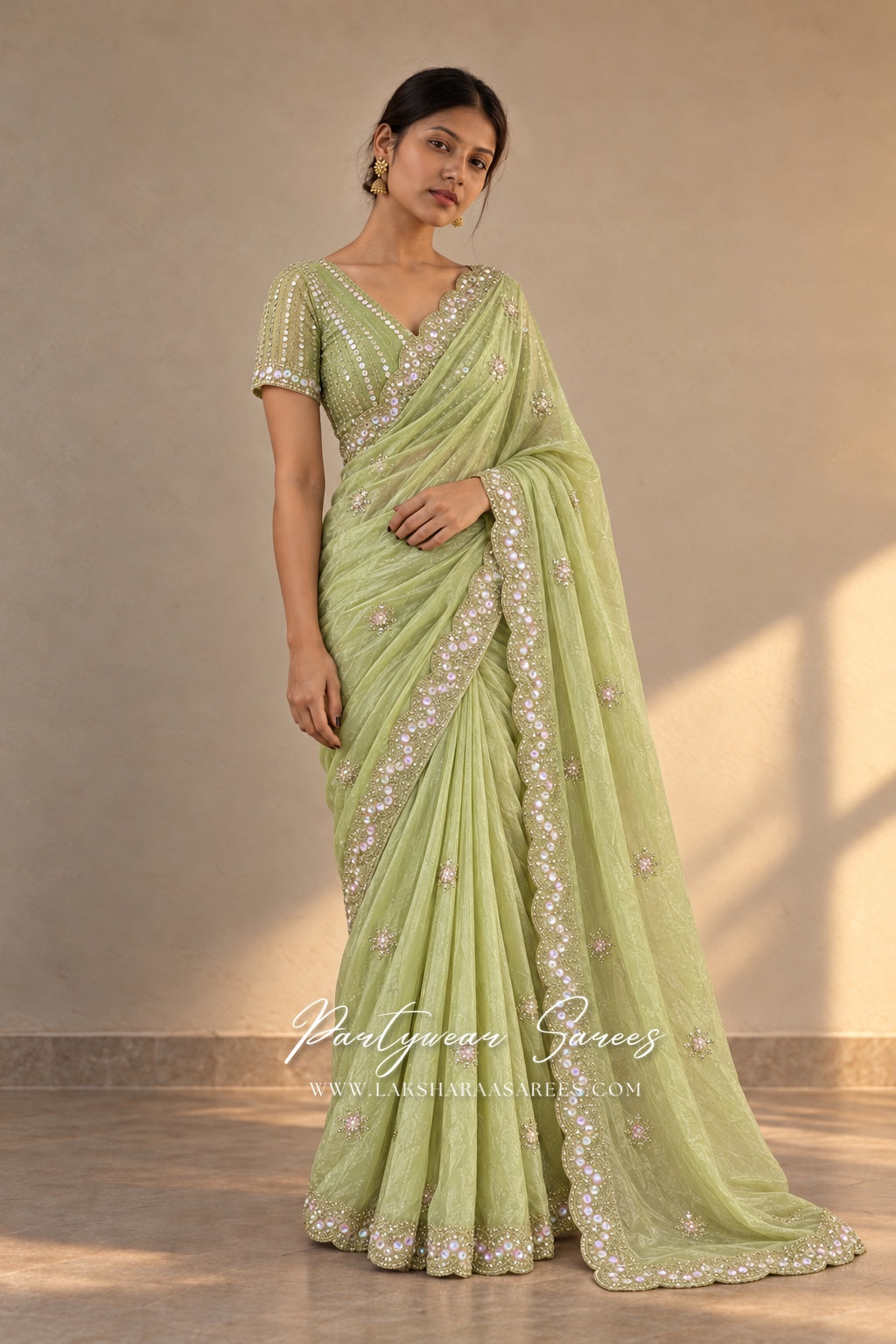 VANESA 2.0 Pistachio Green saree — watermarked model photo